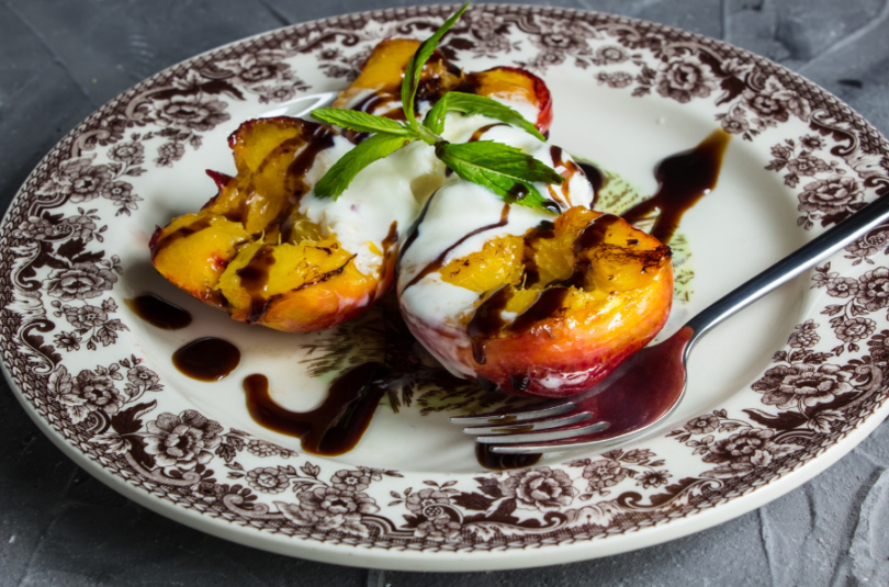Grilled Peaches with Vanilla Ice Cream and Pomegranate Balsamic