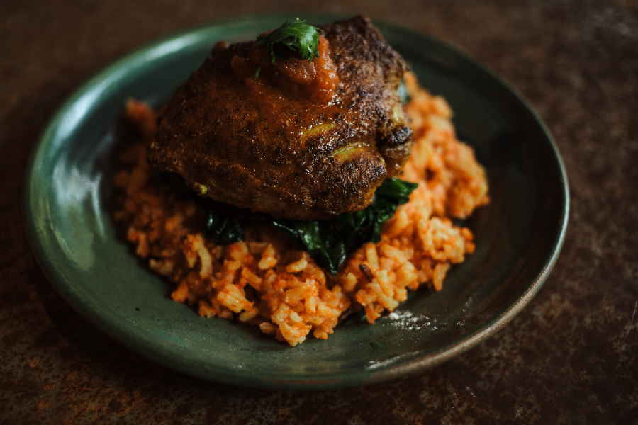 Jollof Rice with Curried Chicken Thighs and Greens