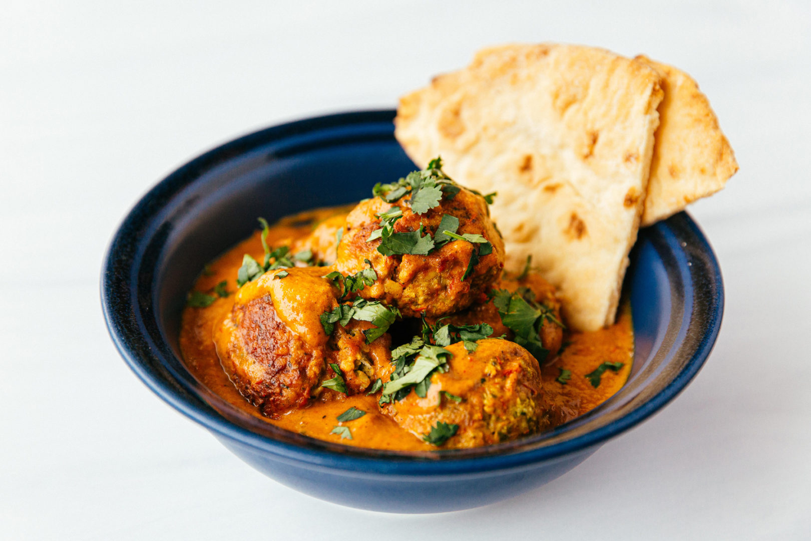 Cashew Coconut Meatballs with Curried Tomato sauce