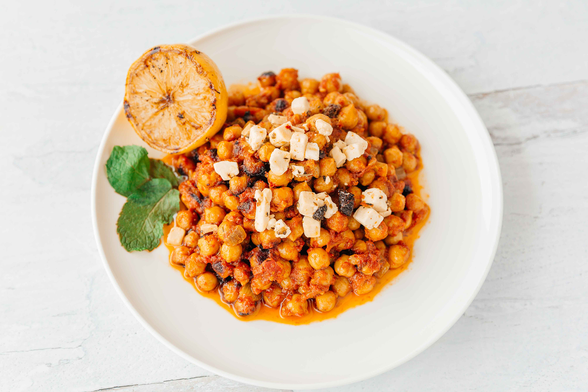 braised curry chickpeas with feta and lemon