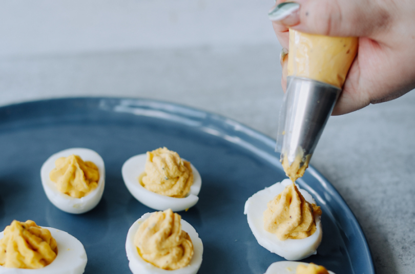 DEVILED EGGS WITH ZHUG & PICKLED RADISHES