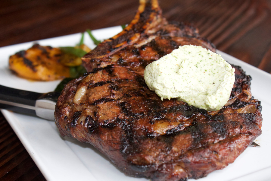 GRILLED BONE-IN RIBEYE WITH COMPOUND BUTTER