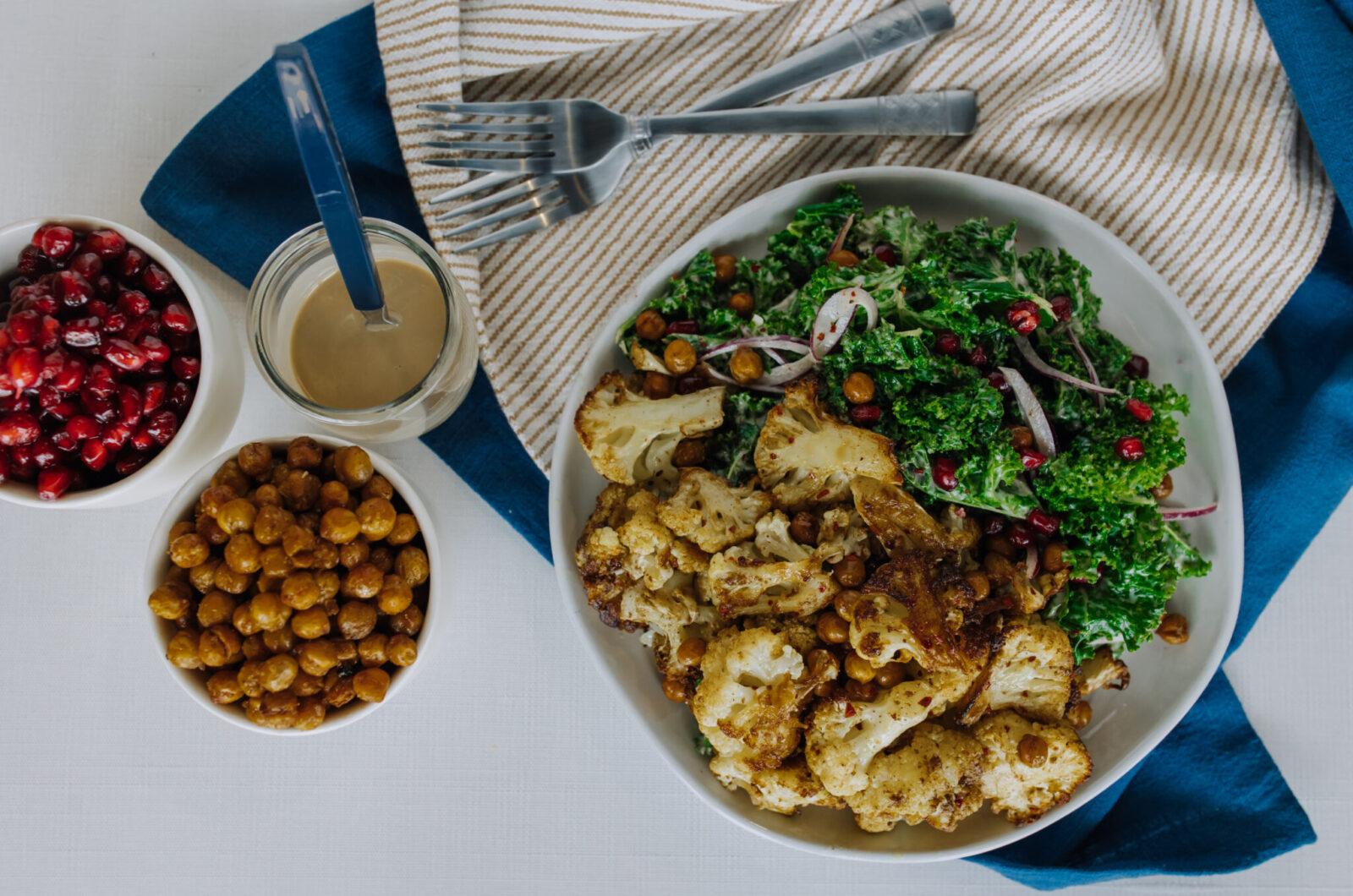 ROASTED CAULIFLOWER, KALE & CHICKPEA SALAD WITH LEMON TAHINI DRESSING