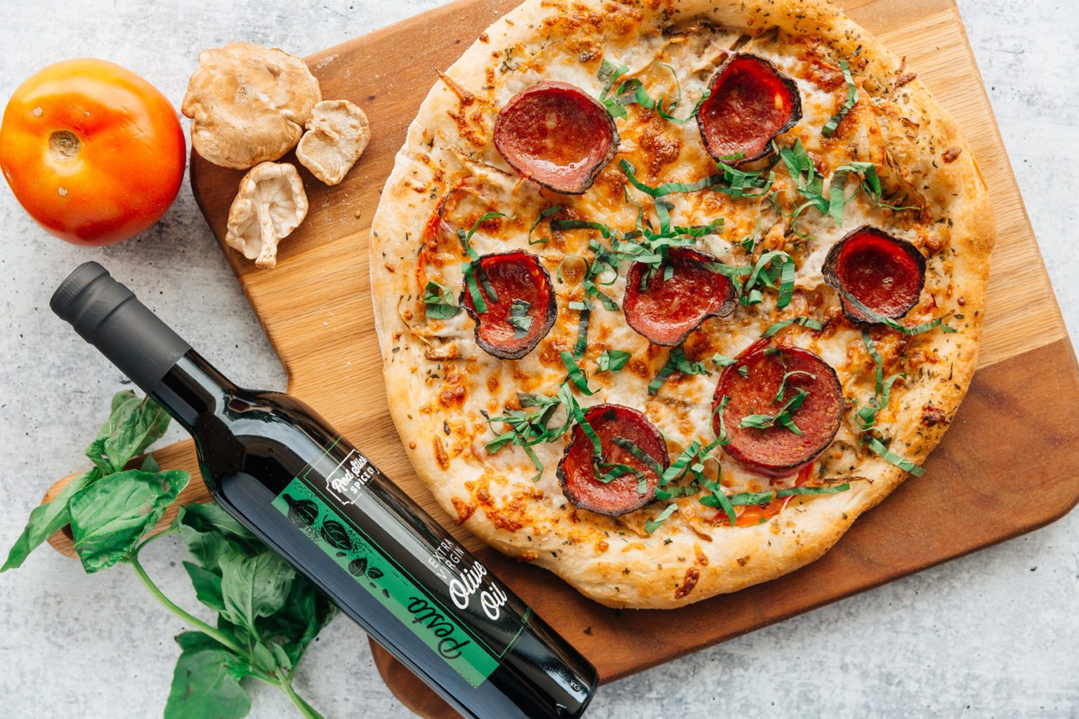 Pepperoni, Mushroom & Fresh Tomato Basil pizza